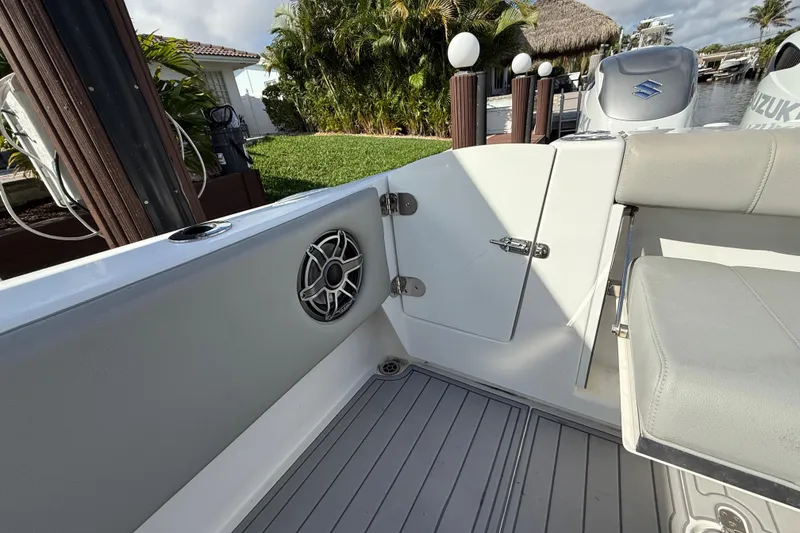 Slide: The Image of 2023 Cape Horn 32 XS boat interior with speaker and seating area. - 51