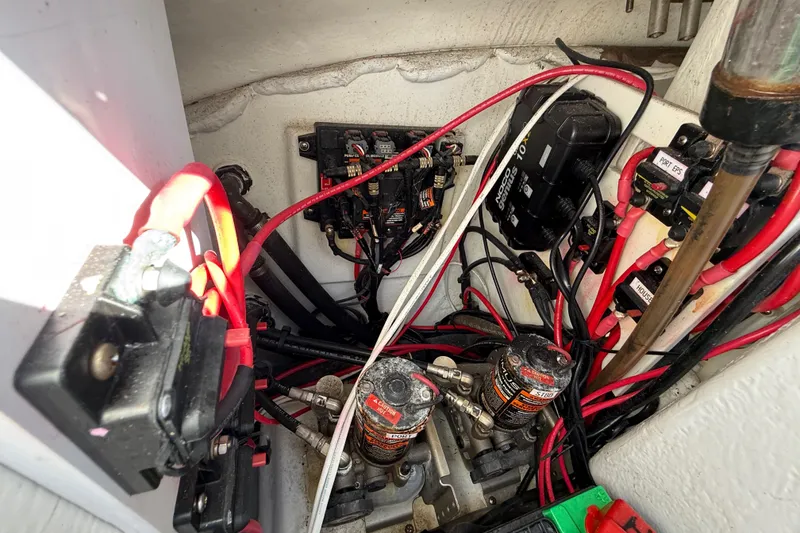 Slide: The Image of Electrical wiring and components inside a 2023 Cape Horn 32 XS boat. - 55