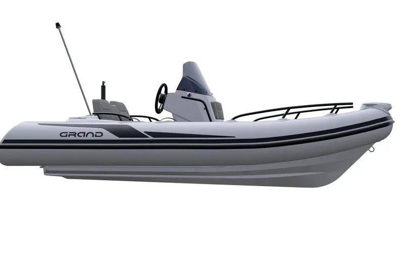 Slide: The Image of 2026 Grand Inflatables G420 boat, sleek design, side view, modern features, white and black accents. - 6