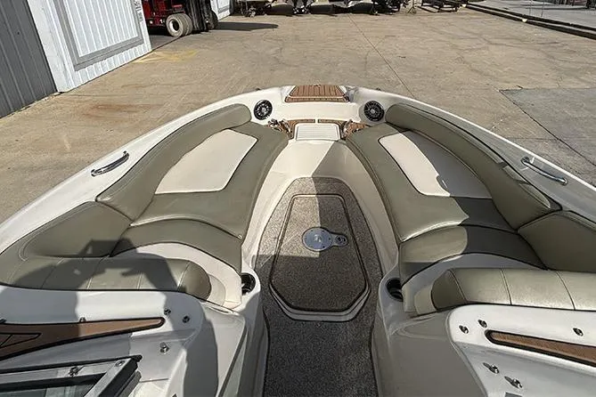 Slide: The Image of 2005 Sea Ray 240 Sundeck boat interior with spacious seating and elegant design. - 23