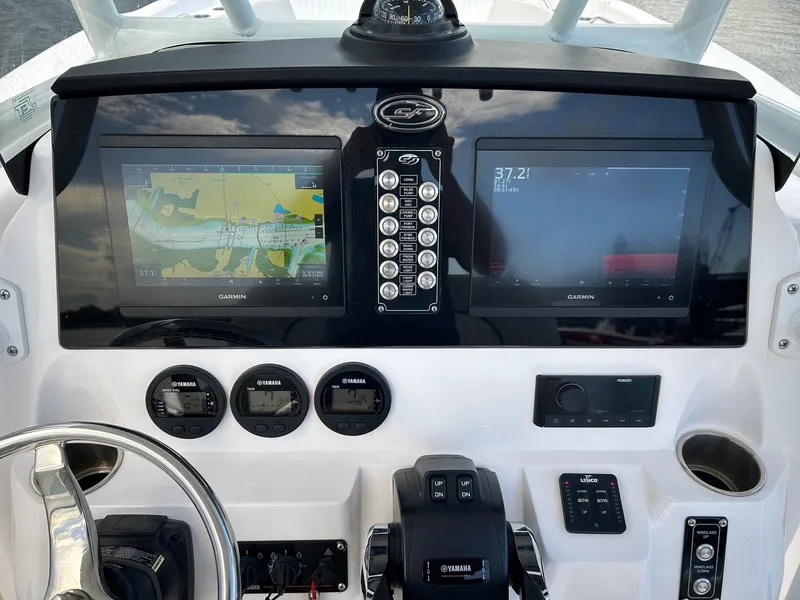 Slide: The Image of Dashboard of 2022 Sea Fox 268 Commander with Garmin displays and Yamaha controls. - 4