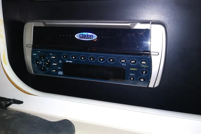 Slide: The Image of Clarion marine stereo system in a 1993 Tiara 3100 Open boat. - 30