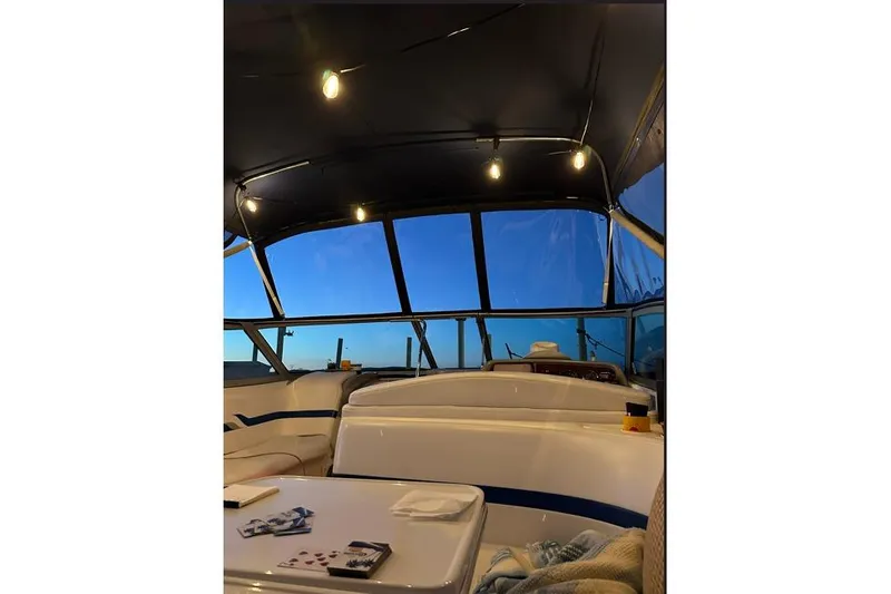 Slide: The Image of Interior view of 2002 Formula 330 Sun Sport boat with evening lighting. - 12