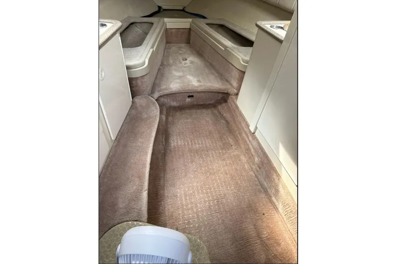 Slide: The Image of 2002 Formula 330 Sun Sport interior cabin with beige carpet and seating. - 15