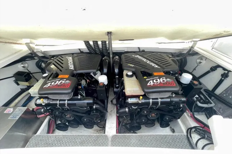 Slide: The Image of 2002 Formula 330 Sun Sport boat with twin MerCruiser 496 MAG engines. - 18