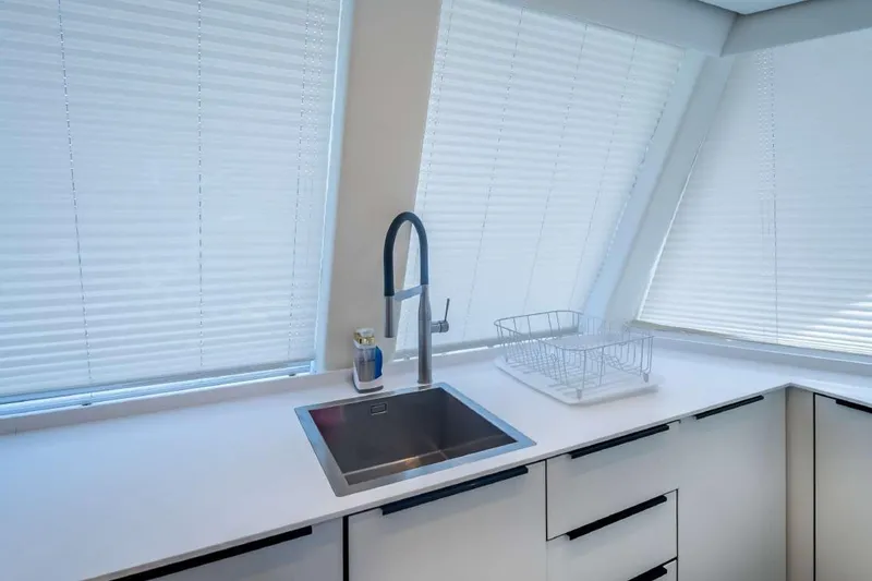 Slide: The Image of Modern kitchen interior of 2021 Sunreef Supreme 68 Power yacht with sleek design. - 12