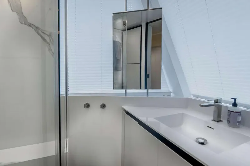 Slide: The Image of Modern bathroom interior on 2021 Sunreef Supreme 68 Power yacht, featuring sleek design and fixtures. - 16