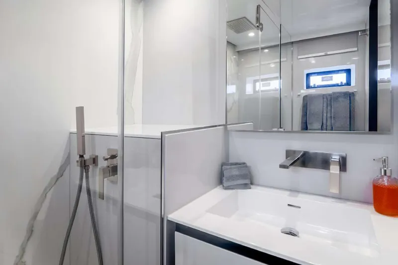 Slide: The Image of Luxurious bathroom in 2021 Sunreef Supreme 68 Power yacht, featuring modern fixtures and sleek design. - 20