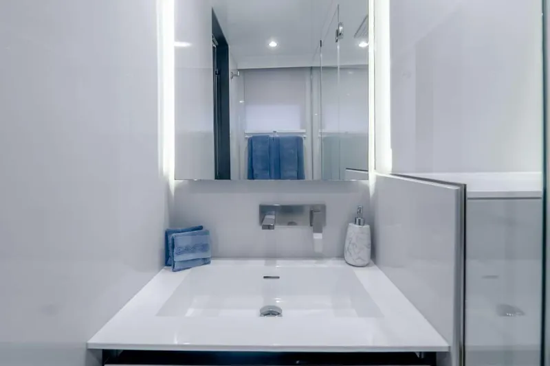 Slide: The Image of Modern bathroom on 2021 Sunreef Supreme 68 Power yacht with sleek sink and mirror. - 27