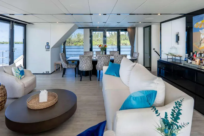 Slide: The Image of Luxurious interior of 2021 Sunreef Supreme 68 Power yacht with elegant seating and dining area. - 36
