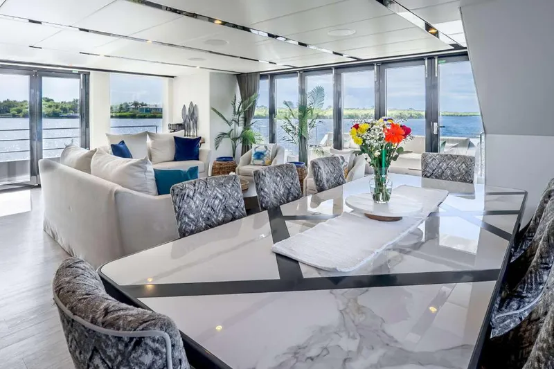 Slide: The Image of Luxurious interior of 2021 Sunreef Supreme 68 Power yacht with elegant dining and lounge area. - 38