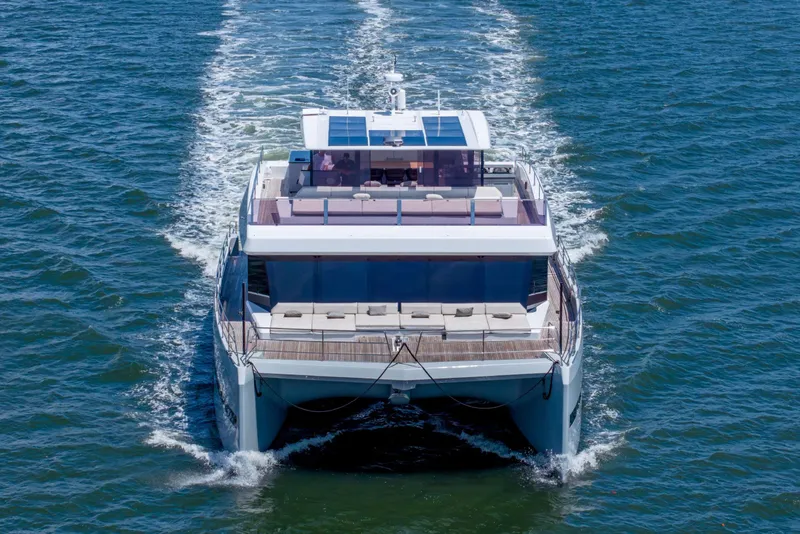 Slide: The Image of Luxury Sunreef Supreme 68 Power yacht cruising on open water, 2021 model. - 4