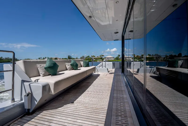 Slide: The Image of Luxurious Sunreef Supreme 68 Power yacht deck with plush seating, 2021 model. - 43