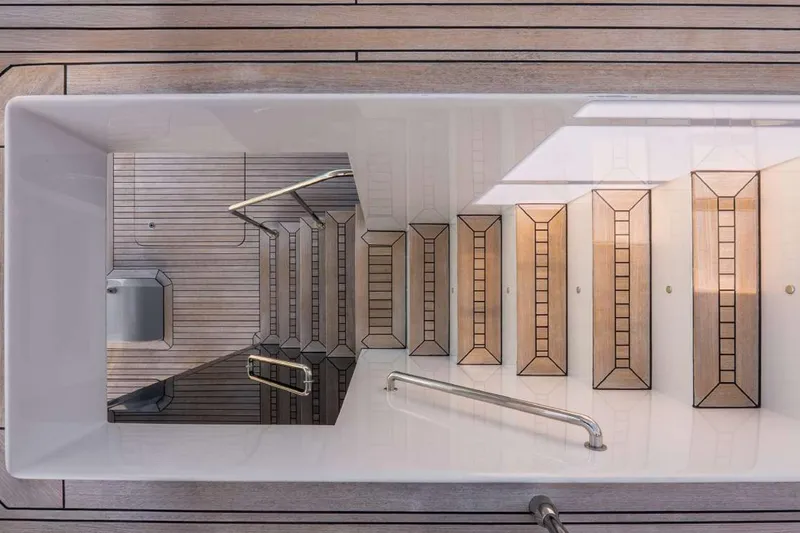 Slide: The Image of Sunreef Supreme 68 Power 2021 yacht interior with elegant wooden staircase design. - 48