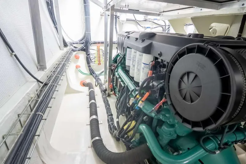 Slide: The Image of Engine room of 2021 Sunreef Supreme 68 Power yacht, showcasing detailed machinery and wiring. - 7