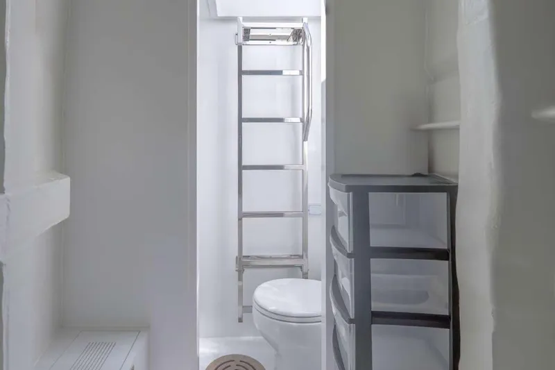 Slide: The Image of Modern bathroom in 2021 Sunreef Supreme 68 Power yacht, featuring sleek design and storage. - 9