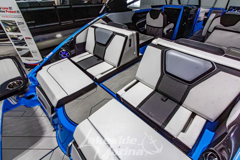 Slide: The Image of 2023 Yamaha Boats 255XE interior with modern seating and sleek design. - 16