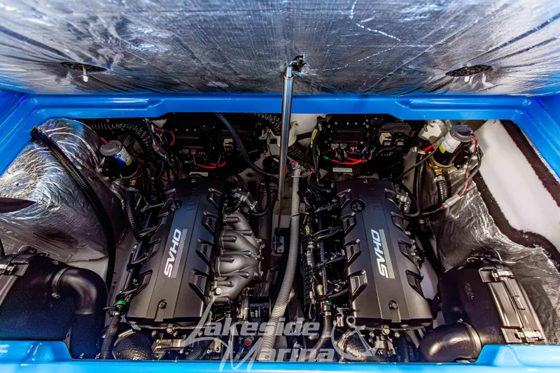 Slide: The Image of 2023 Yamaha Boats 255XE engine compartment showcasing dual SVHO engines. - 21
