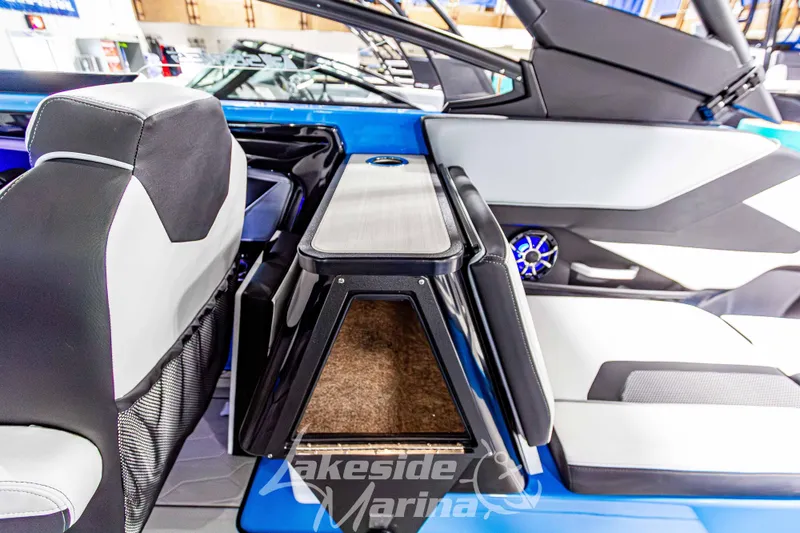 Slide: The Image of 2023 Yamaha Boats 255XE interior with sleek seating and modern design features. - 23