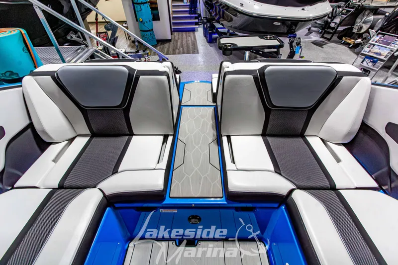 Slide: The Image of 2023 Yamaha Boats 255XE interior seating with modern design and comfortable upholstery. - 25