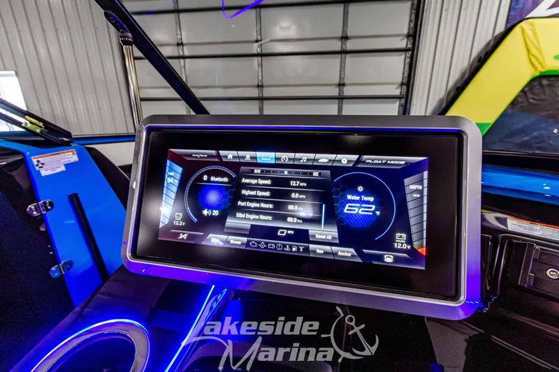 Slide: The Image of 2023 Yamaha Boats 255XE dashboard display with navigation and engine data. - 34