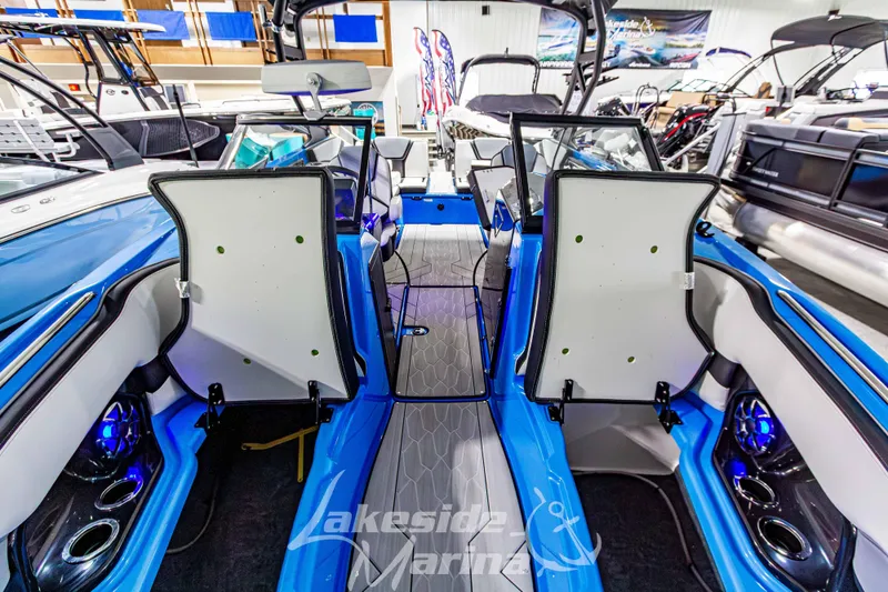 Slide: The Image of 2023 Yamaha Boats 255XE interior showcasing seating and modern design at Lakeside Marina. - 47