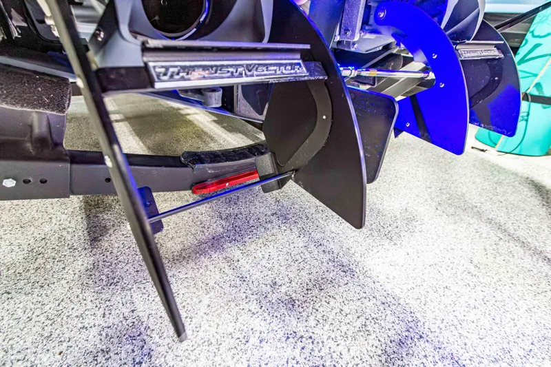 Slide: The Image of 2023 Yamaha Boats 255XE thrust vector system close-up in a showroom. - 8
