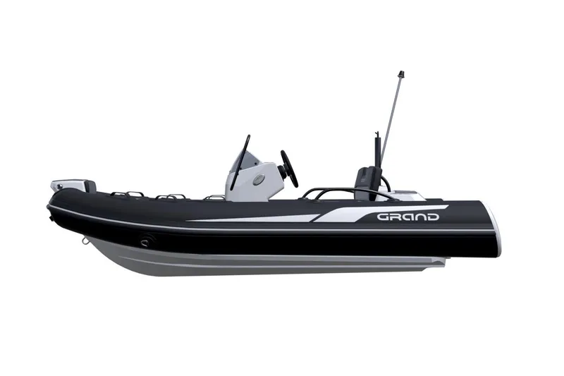 Slide: The Image of 2026 Grand Inflatables G380N boat, sleek black design, side view. - 3