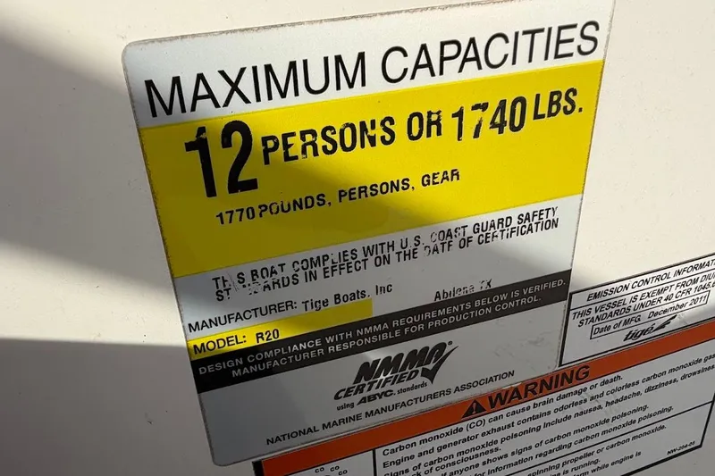 Slide: The Image of 2012 Tigé R20 boat capacity label, maximum 12 persons or 1740 lbs. - 13