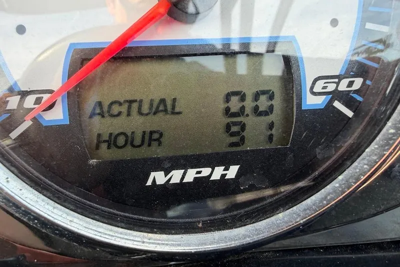 Slide: The Image of Close-up of 2012 Tigé R20 speedometer showing 0.0 MPH and 91 hours. - 20