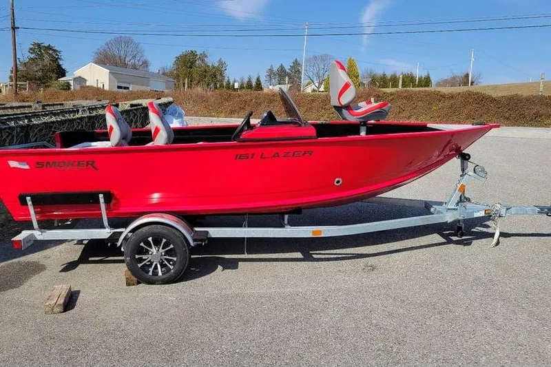 The Image of 2026 Smoker Craft Lazer 161 boat in vibrant red on a trailer. - 0