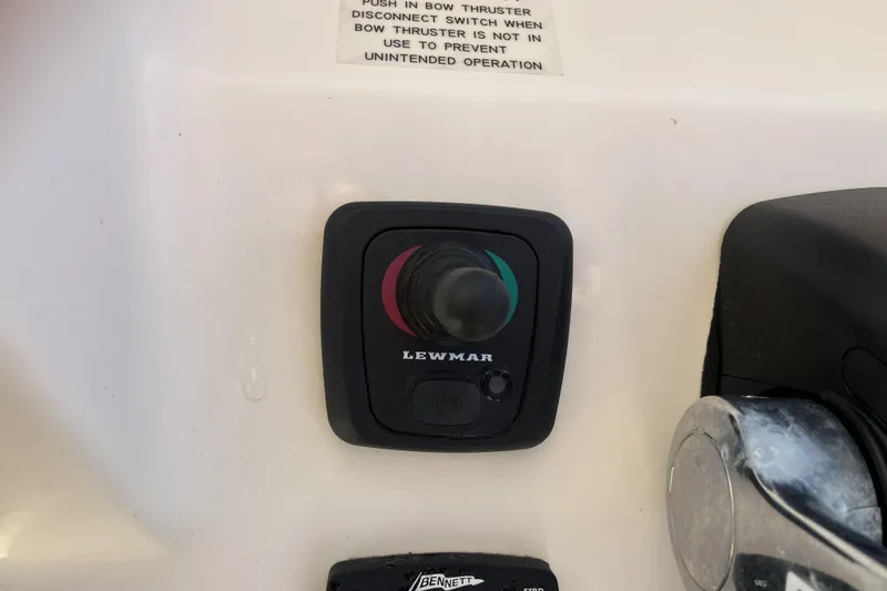 Slide: The Image of Control panel of a 2019 Grady-White Freedom 307 boat with Lewmar joystick. - 11