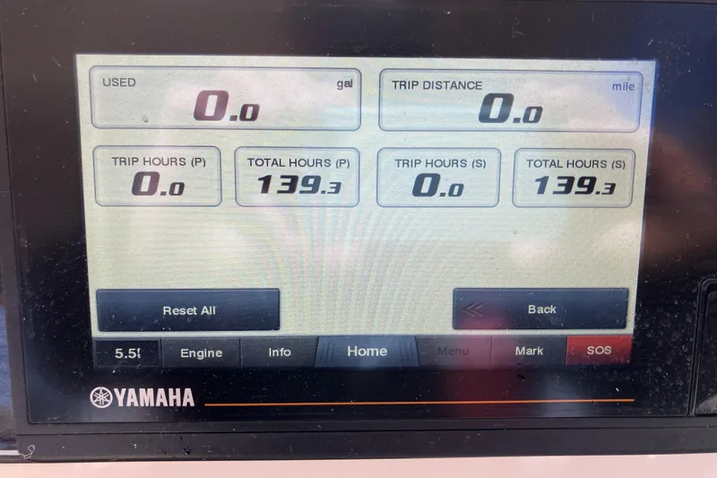 Slide: The Image of Yamaha display showing trip and total hours for Grady-White Freedom 307, 2019 model. - 14