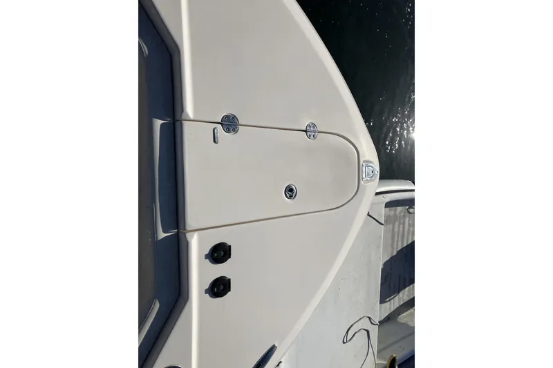 Slide: The Image of 2019 Grady-White Freedom 307 boat deck, featuring sleek design and hardware details. - 21