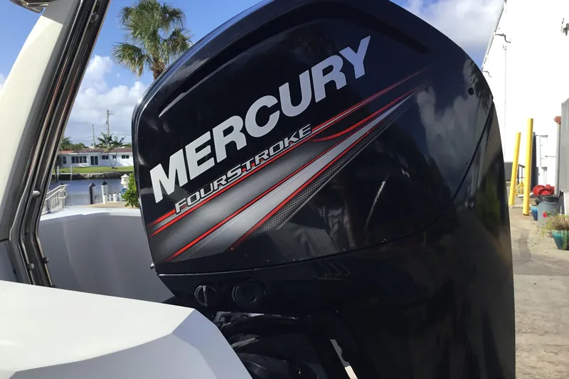 Slide: The Image of Mercury FourStroke engine on 2018 Brig E 480 boat, dockside view. - 10