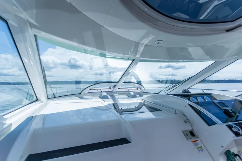 Slide: The Image of 2011 Sea Ray 450 Sundancer yacht interior with panoramic ocean view. - 24