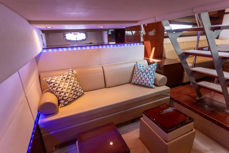 Slide: The Image of Luxurious interior of 2011 Sea Ray 450 Sundancer yacht with cozy seating and modern decor. - 34