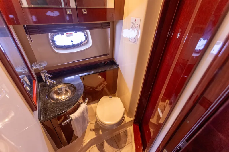 Slide: The Image of Luxurious bathroom in 2011 Sea Ray 450 Sundancer yacht with sink and toilet. - 41