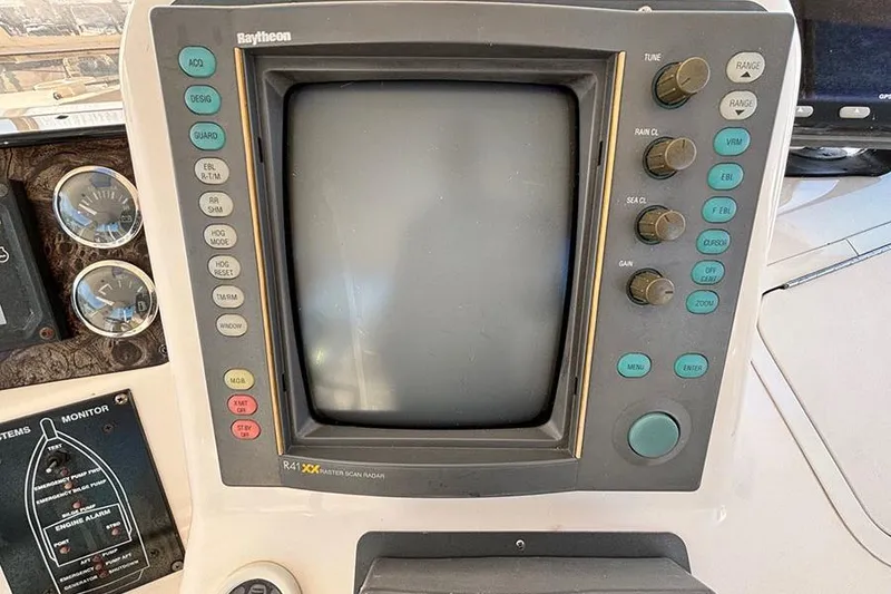 Slide: The Image of Raytheon radar display on 1998 Sea Ray 480 Sedan Bridge yacht dashboard. - 18