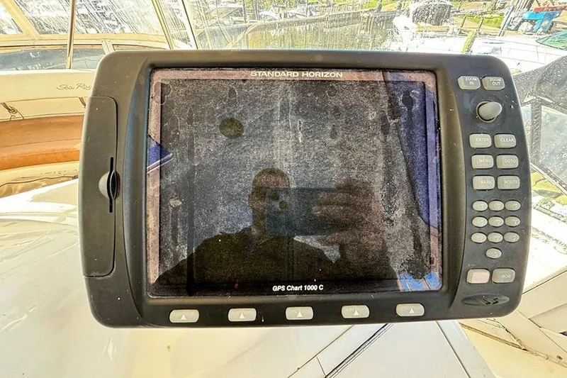 Slide: The Image of Standard Horizon GPS device on 1998 Sea Ray 480 Sedan Bridge yacht. - 19