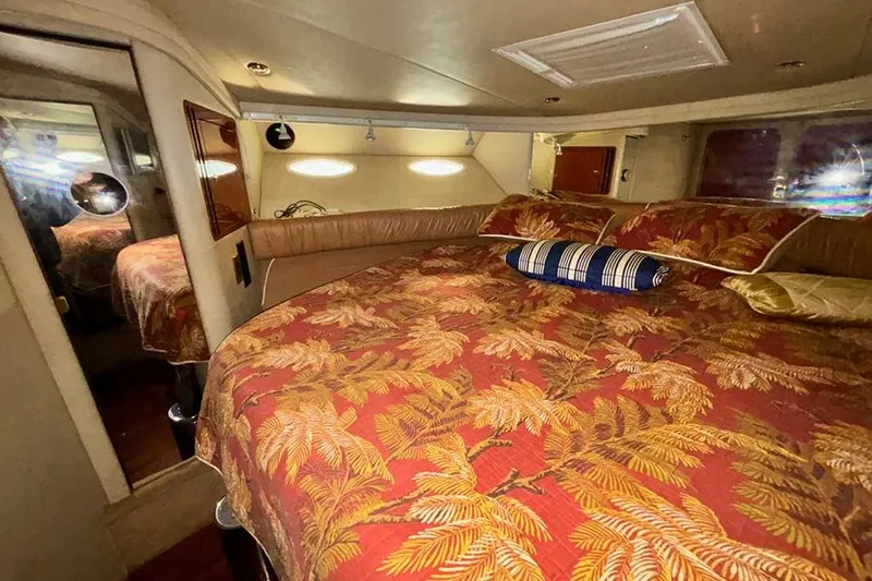Slide: The Image of Luxurious cabin interior of 1998 Sea Ray 480 Sedan Bridge yacht. - 33