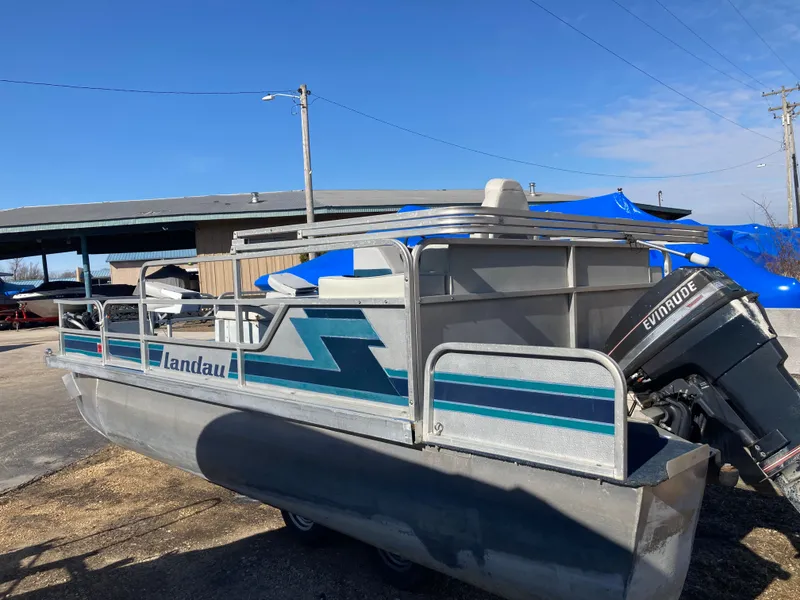 Slide: The Image of 1991 Landau 18 Cruise Bandit pontoon boat with Evinrude motor. - 2