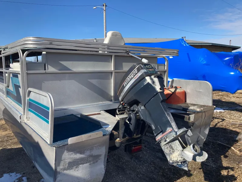 Slide: The Image of 1991 Landau 18 Cruise Bandit pontoon boat with outboard motor. - 3