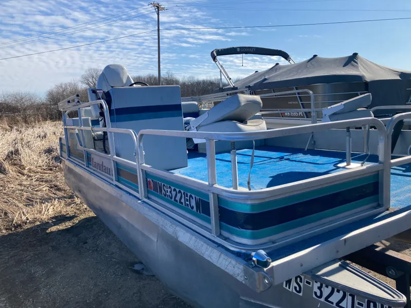 Slide: The Image of 1991 Landau 18 Cruise Bandit pontoon boat on dry land. - 6