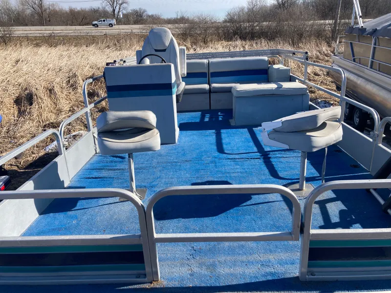 Slide: The Image of 1991 Landau 18 Cruise Bandit pontoon boat with blue carpet interior. - 7