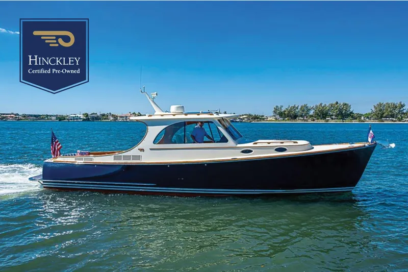 The Image of 2016 Hinckley Picnic Boat MKIII cruising on water, certified pre-owned. - 0