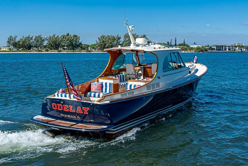 Slide: The Image of 2016 Hinckley Picnic Boat MKIII cruising on blue waters near Palm Beach, Florida. - 3