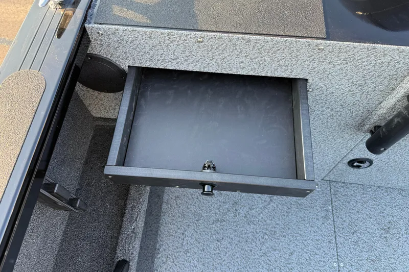 Slide: The Image of Open storage drawer in 2026 Crestliner 1850 Commander Elite boat interior. - 14
