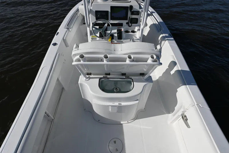 Slide: The Image of 2016 Sea Hunt Ultra 235 SE boat interior with helm and seating. - 16