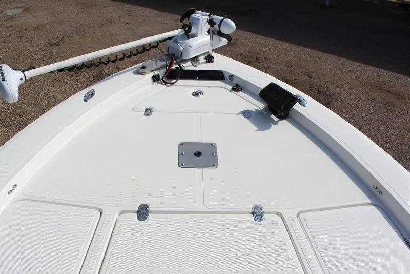 Slide: The Image of Bow of 2009 Kenner 2201 boat with trolling motor and storage compartments. - 17